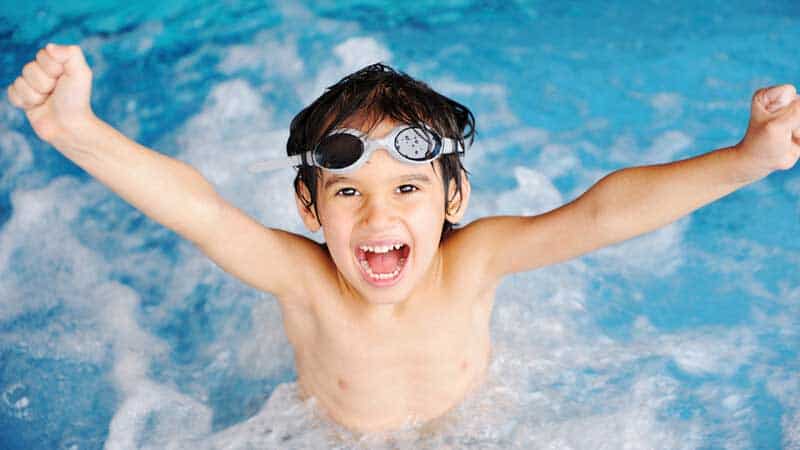 kid in swimming pool