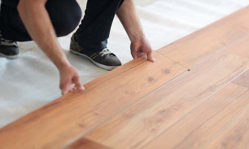 can you lay laminate flooring over tile